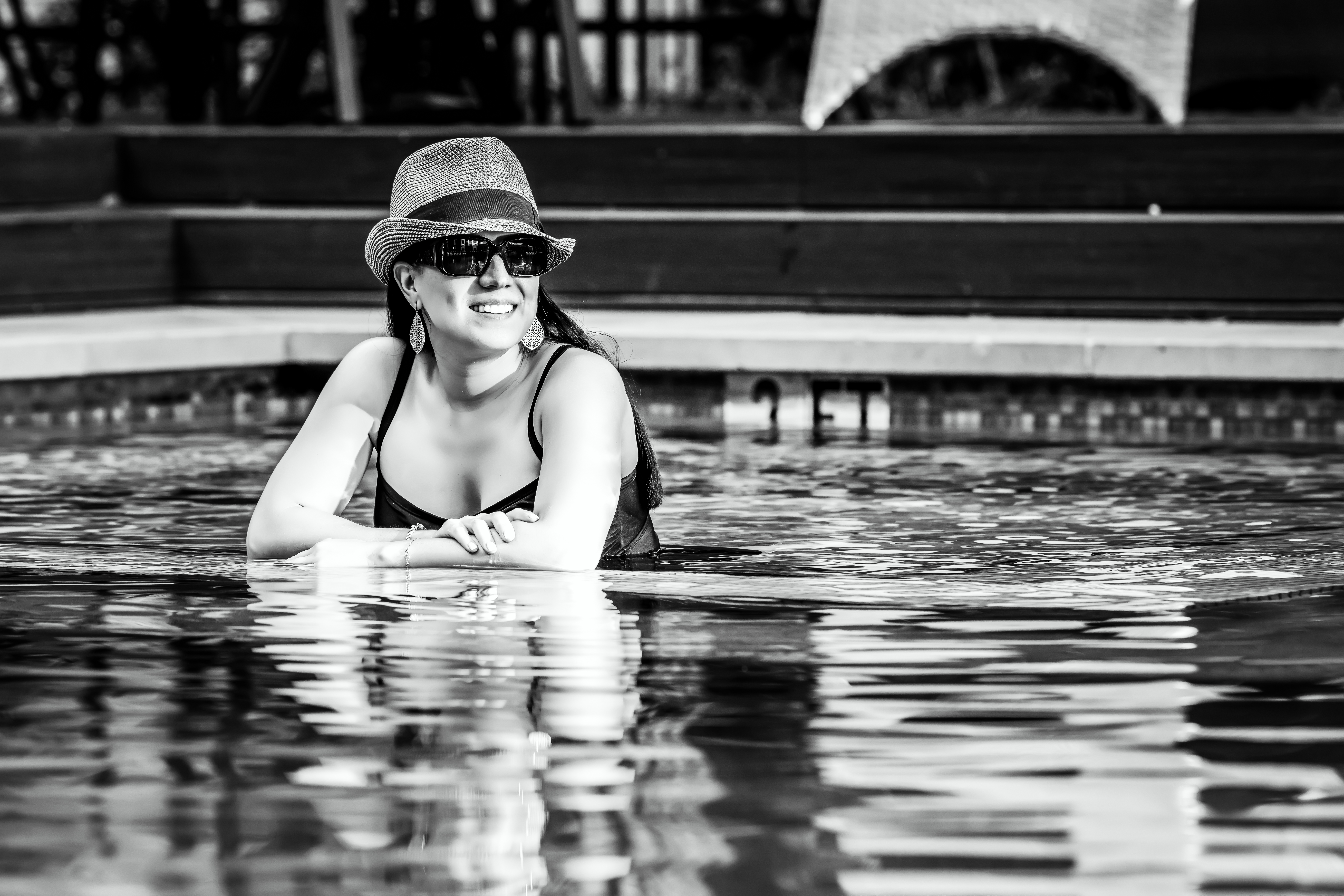 Black and White photo of woman in Pool